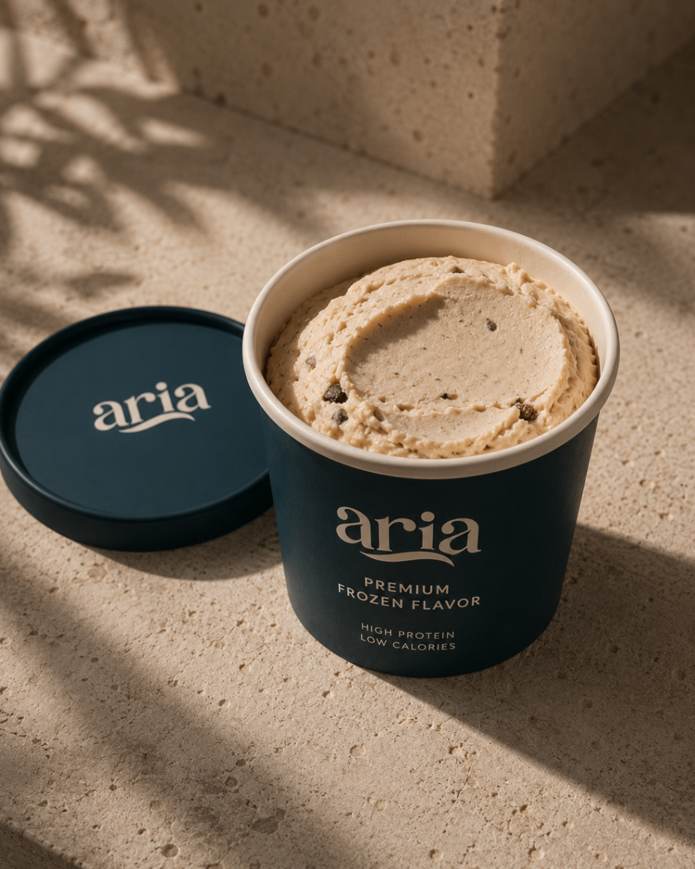 An open ARIA pint revealing texture in warm light